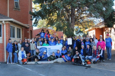 Civilians and veterans gather to volunteer in their community